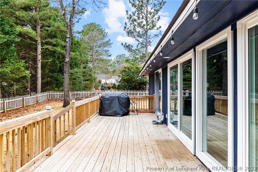 680 Burning Tree Road Pinehurst, NC 28374 - Photo 38 of 43 a view of balcony with wooden floor and seating space
