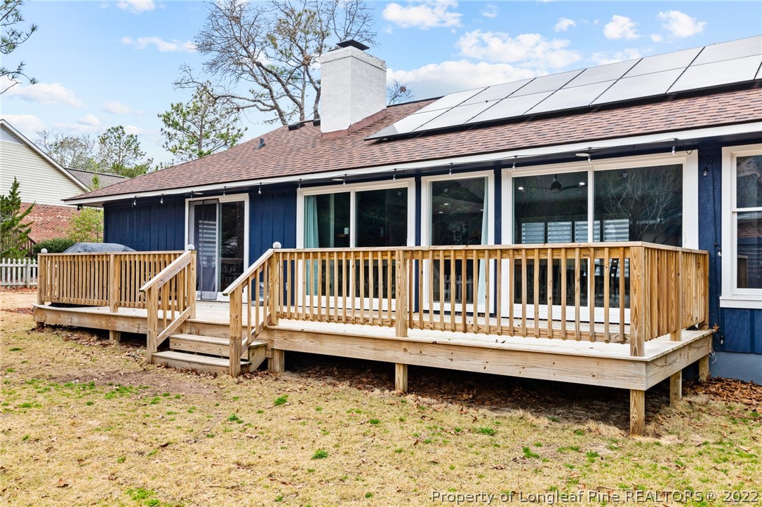 680 Burning Tree Road Pinehurst, NC 28374 - Photo 43 of 43 a view of a house with a wooden deck