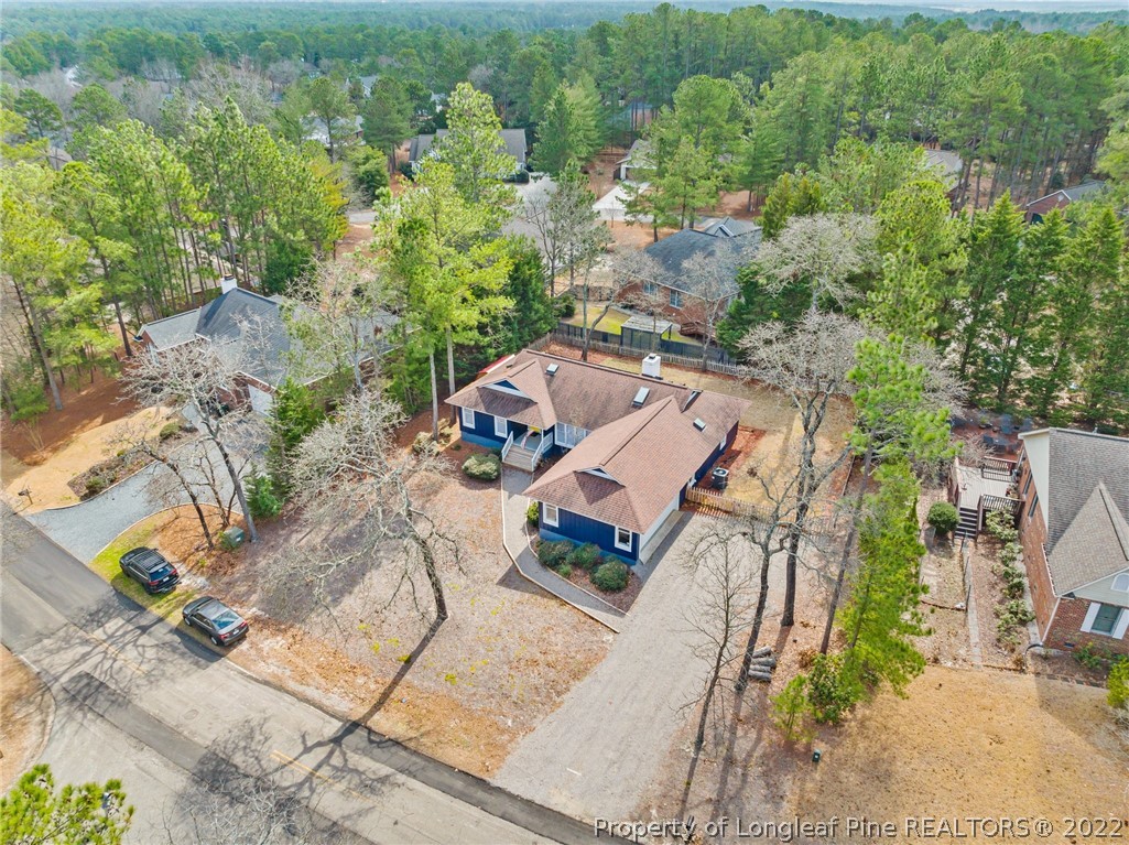 680 Burning Tree Road Pinehurst, NC 28374 - Photo 5 of 43 an aerial view of a house with outdoor space