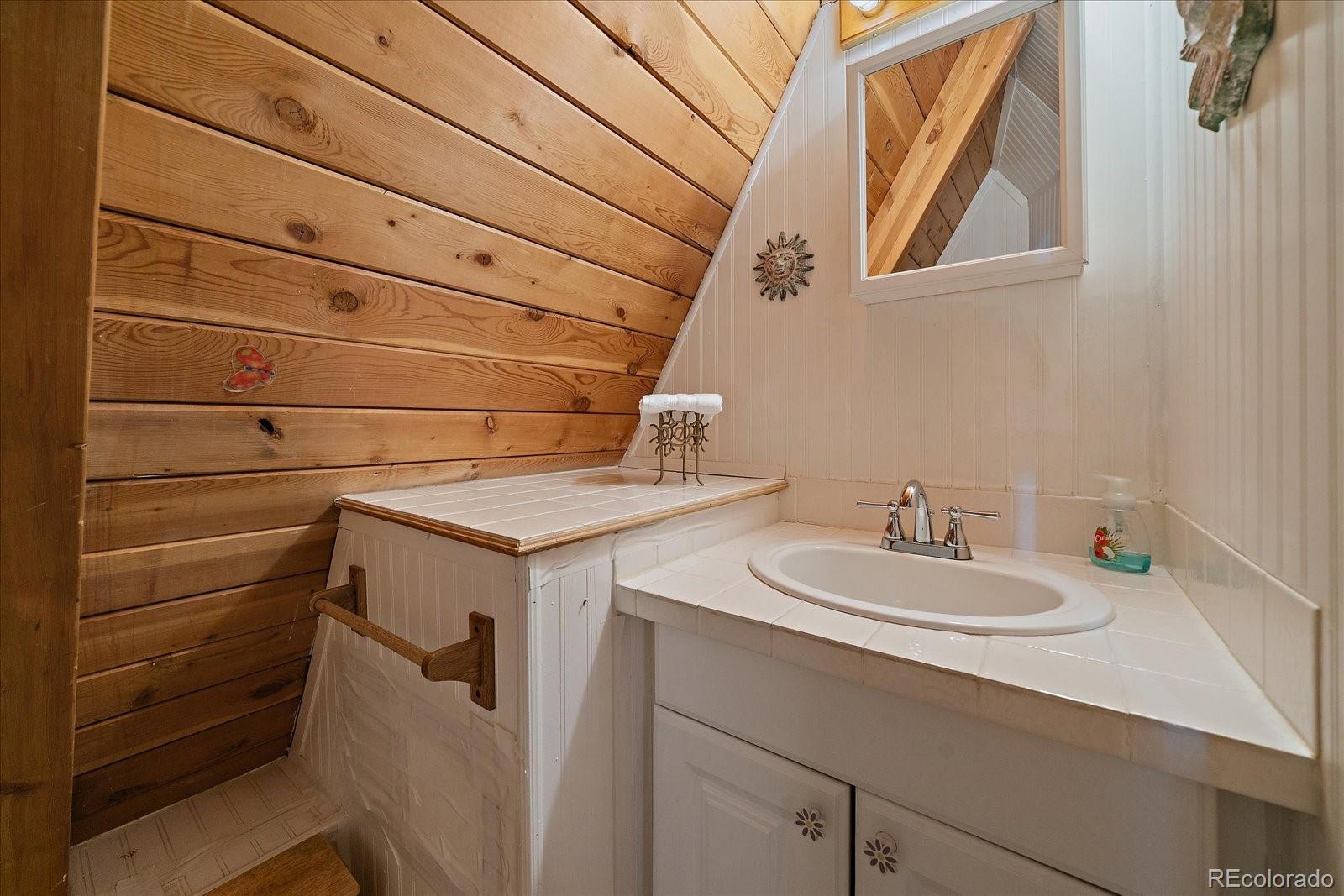 307 Snyder Mountain Road Evergreen, CO 80439 - Photo 25 of 41 a utility room with dryer and washer