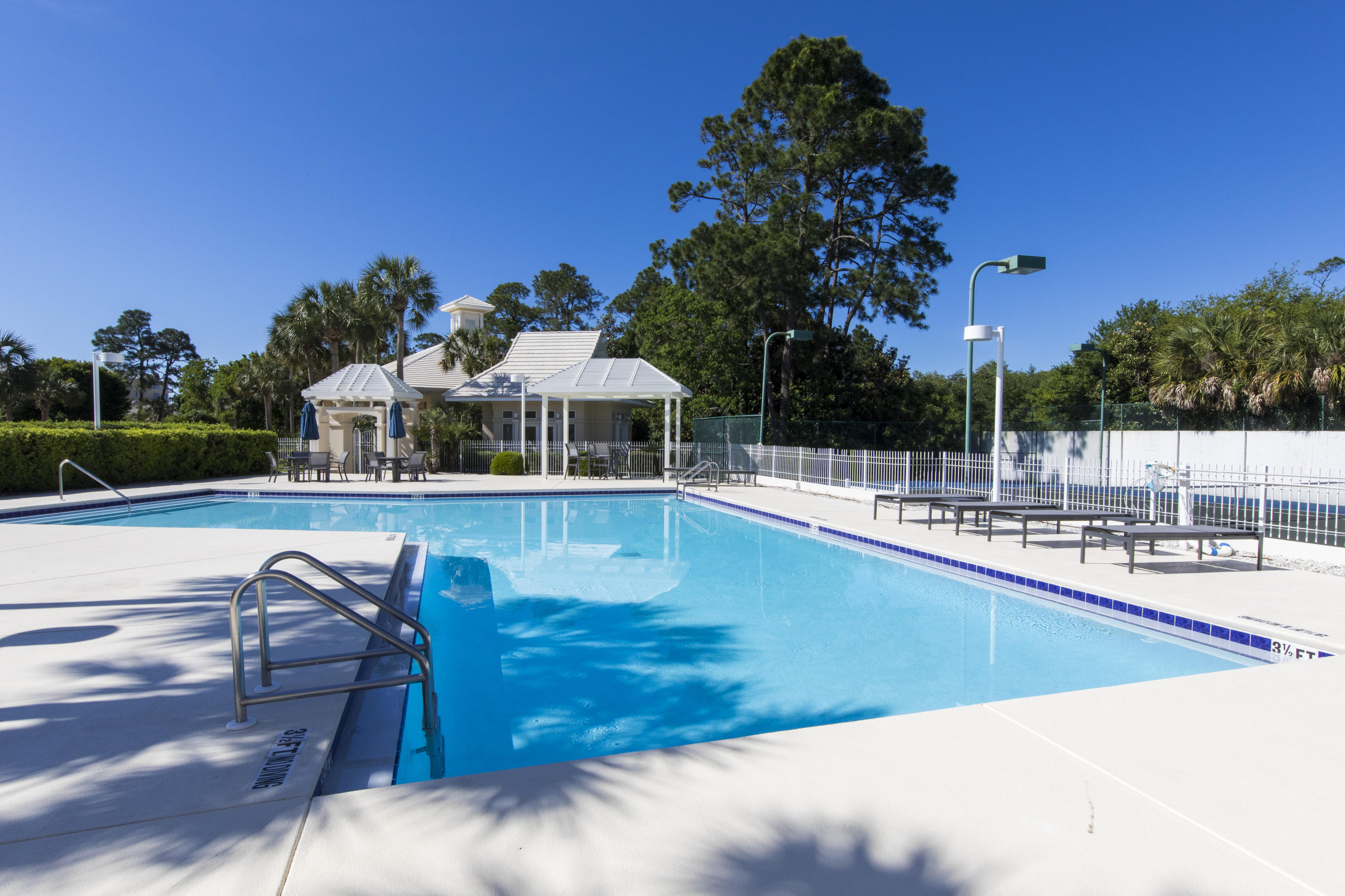 Lot 7 White Cliffs Drive Santa Rosa Beach, FL 32459 - Photo 5 of 12 a view of a swimming pool with a patio