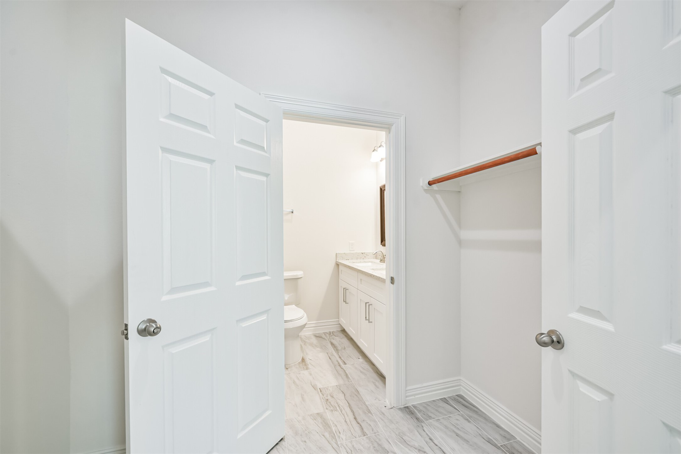 5114 Higgins Street, Unit A Houston, TX 77033 - Photo 16 of 28 a bathroom with a sink and a toilet
