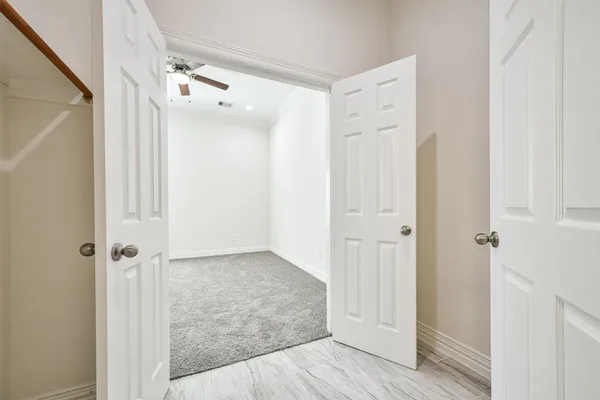a bathroom with a toilet and a bathtub