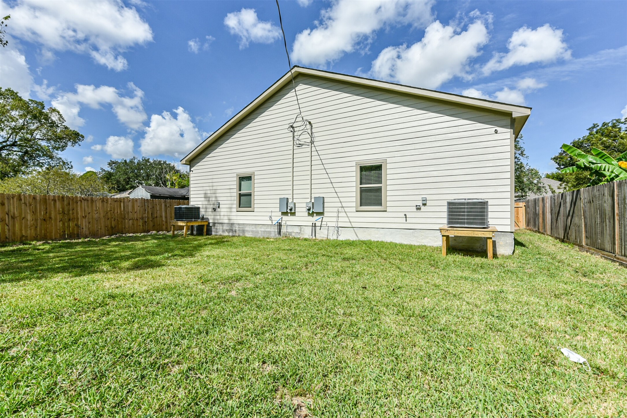5114 Higgins Street, Unit A Houston, TX 77033 - Photo 26 of 28 a view of backyard with a garden and entertaining space