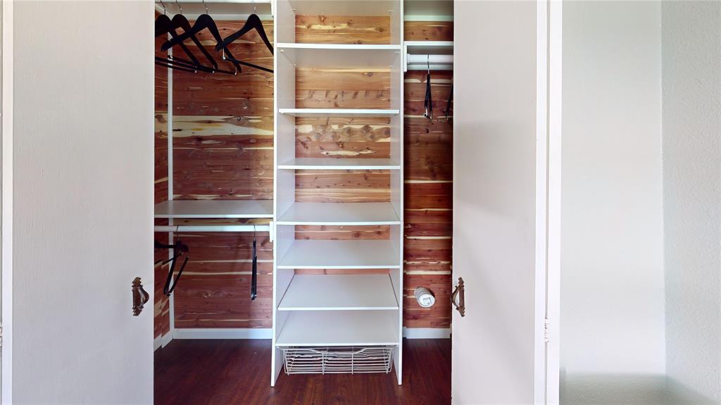 202 River Oaks Road Early, TX 76802 - Photo 15 of 37 a view of walk in closet with empty racks