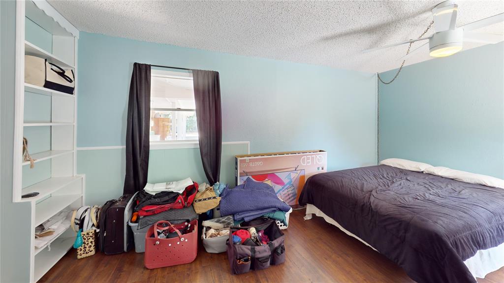 202 River Oaks Road Early, TX 76802 - Photo 20 of 37 a bedroom with bed and a window