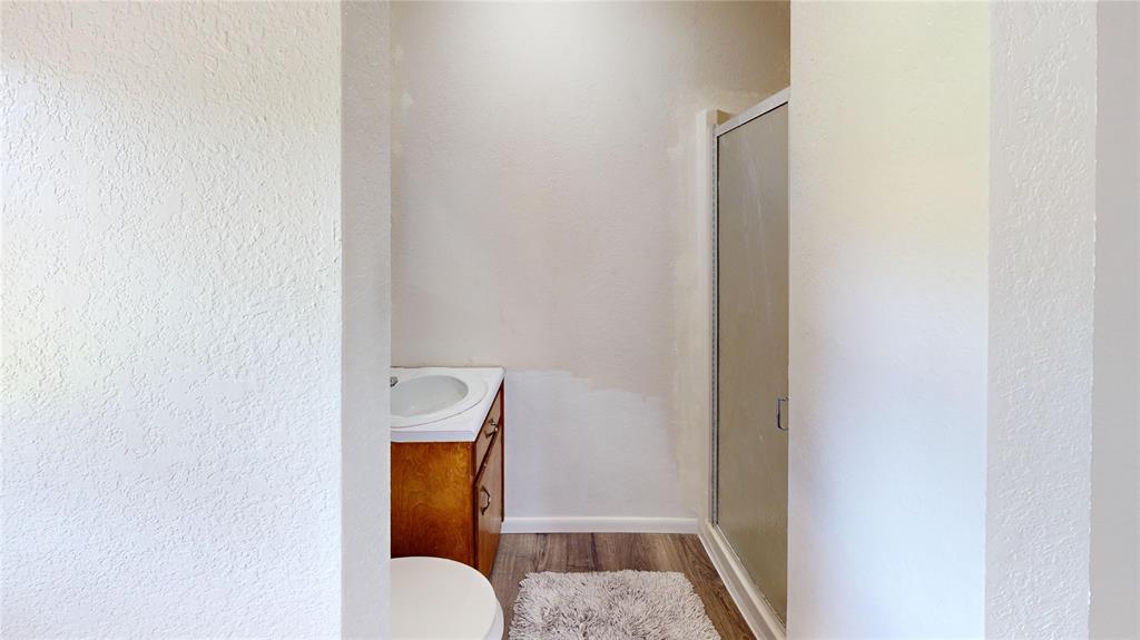202 River Oaks Road Early, TX 76802 - Photo 24 of 37 a bathroom with a toilet