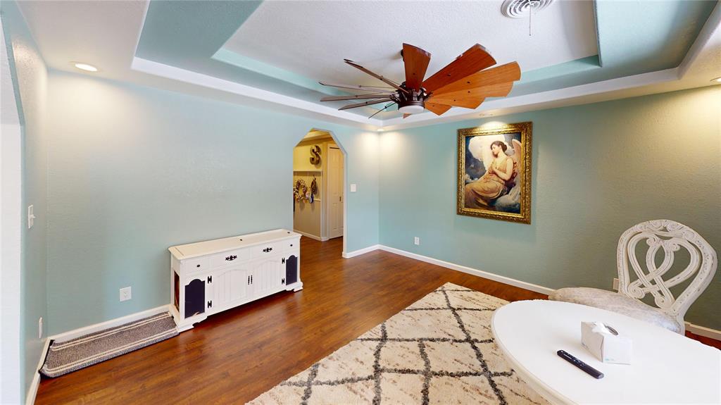 202 River Oaks Road Early, TX 76802 - Photo 3 of 37 a view of a room with wooden floor and windows