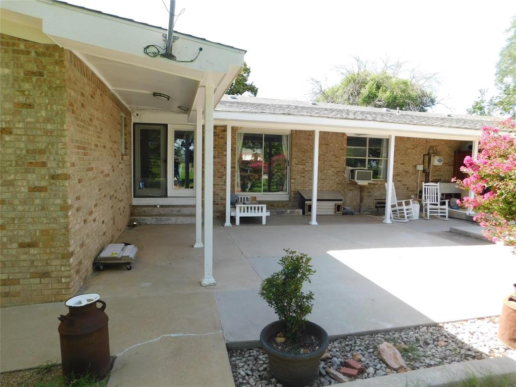 202 River Oaks Road Early, TX 76802 - Photo 35 of 37 a lobby with furniture and potted plants