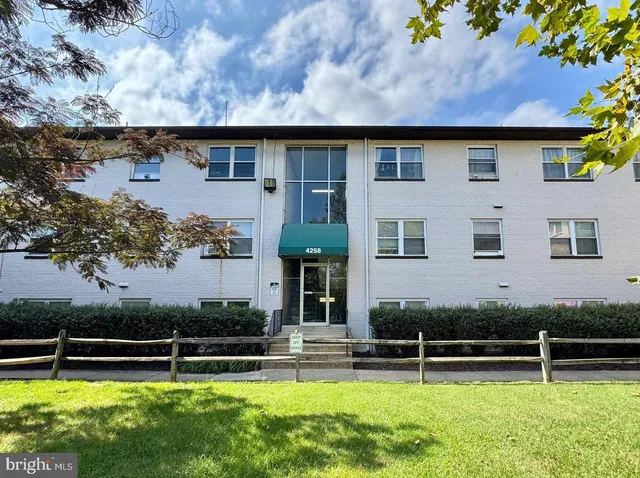 a view of a house with a swimming pool