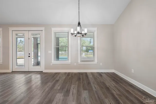 a kitchen with a sink stove and refrigerator
