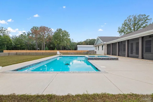 a view of a yard with an outdoor space