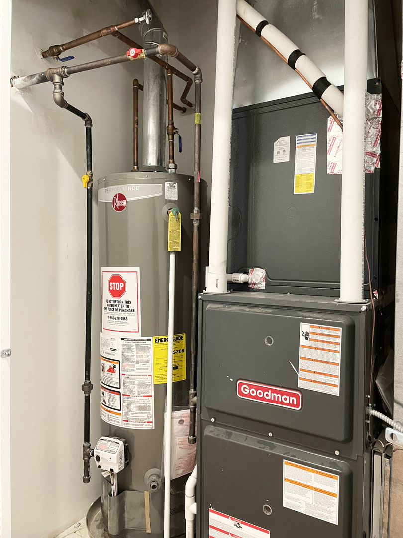 523 West 65th Place Chicago, IL 60621 - Photo 18 of 19 a view of a house with parking area