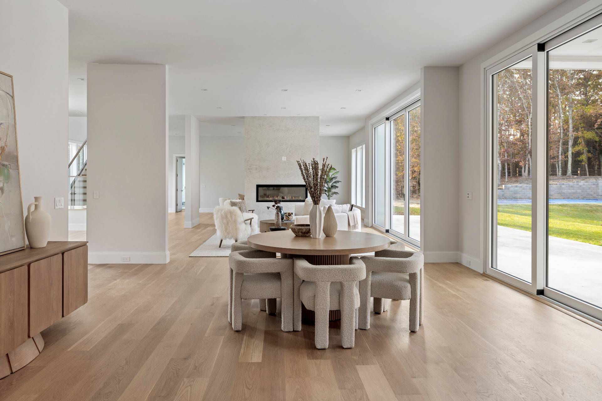 2069 Deerfield Road Sag Harbor, NY 11963 - Photo 14 of 37 a view of a dining room with furniture window and wooden floor
