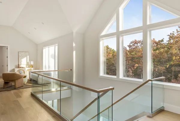 a view of a living room with a large window