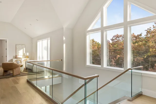 a view of a living room with a large window