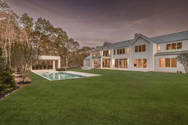 a view of a house with a swimming pool