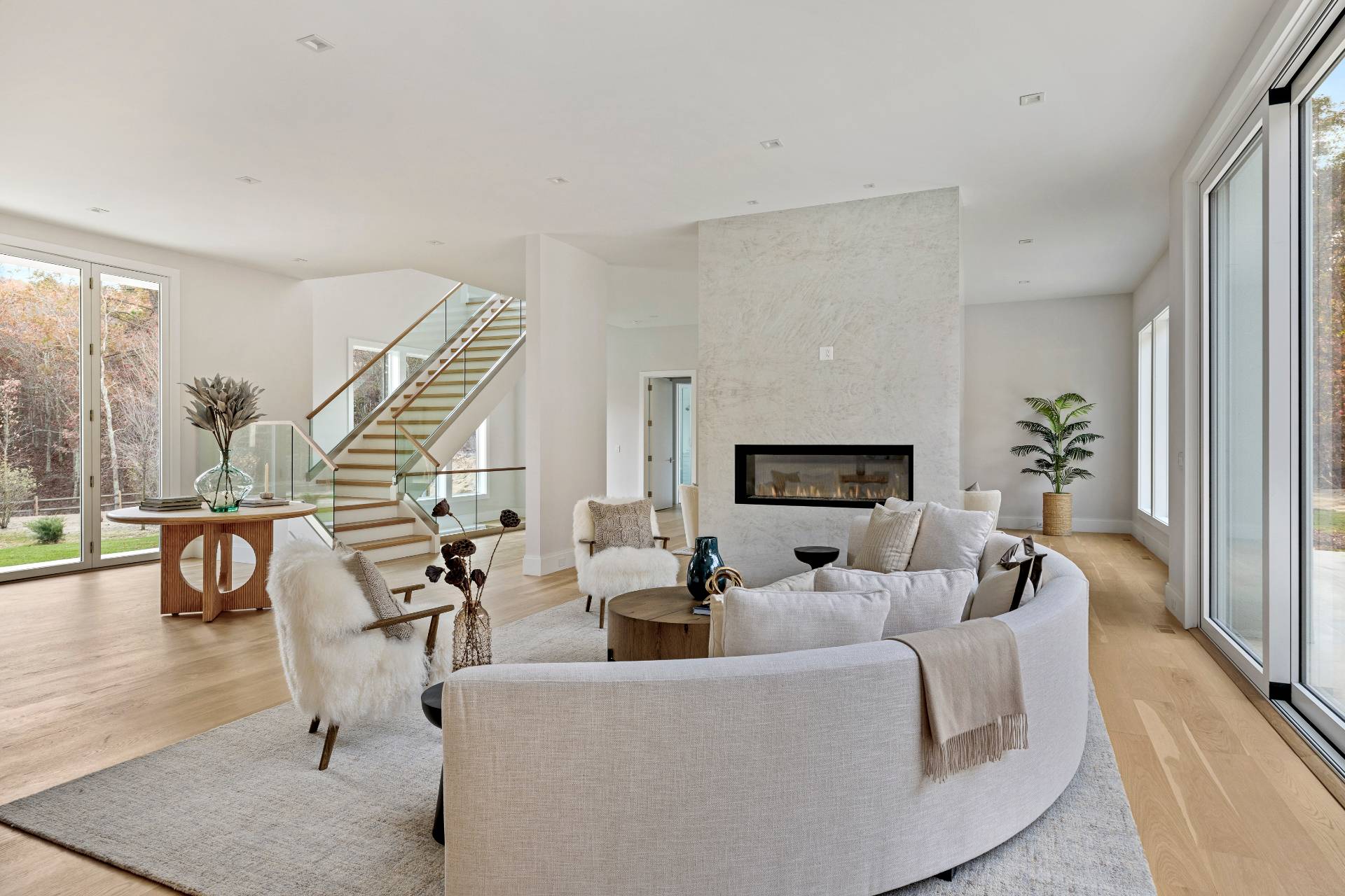 2069 Deerfield Road Sag Harbor, NY 11963 - Photo 8 of 37 a living room with furniture and a wooden floor