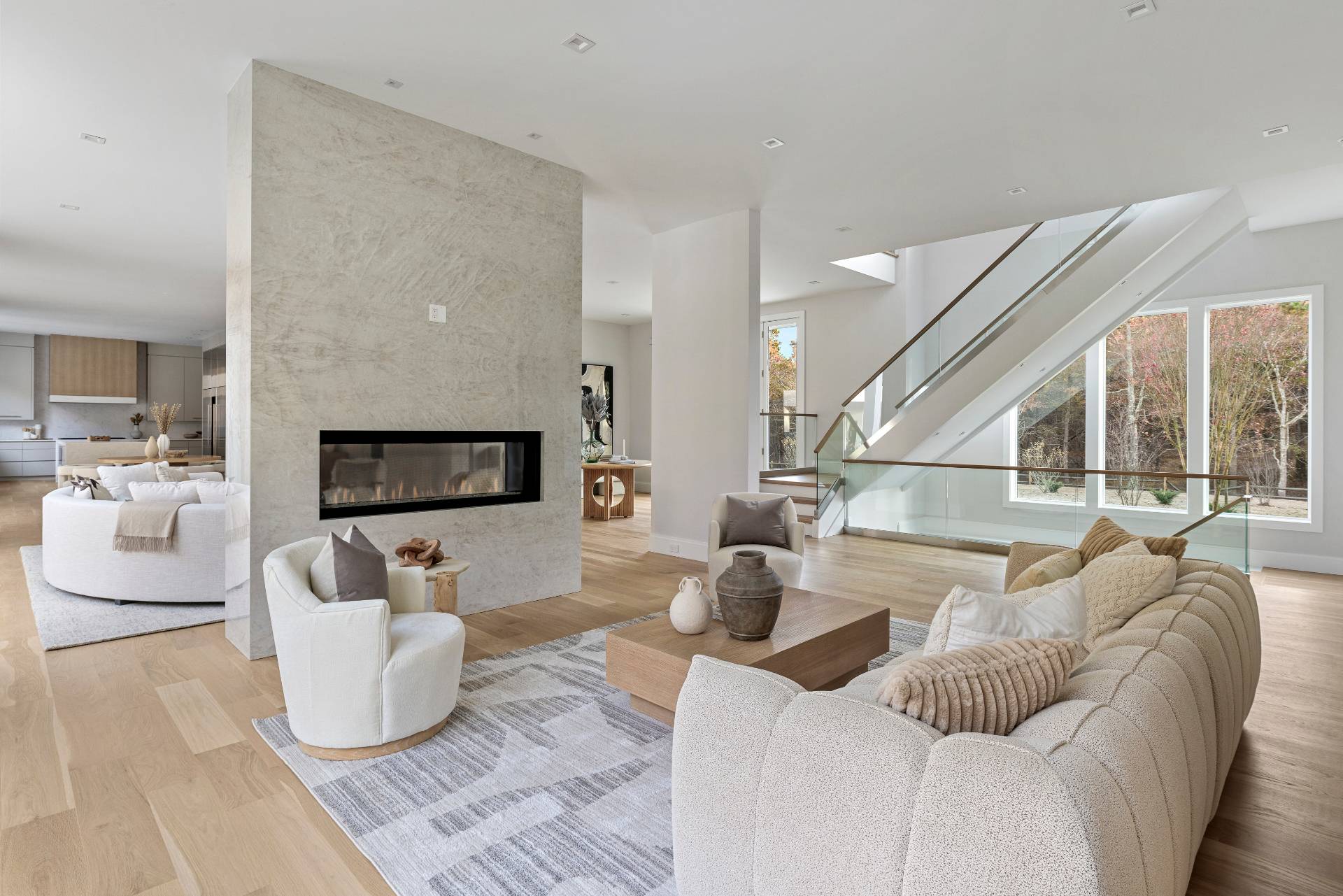 2069 Deerfield Road Sag Harbor, NY 11963 - Photo 10 of 37 a living room with furniture and a flat screen tv