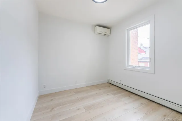 a view of a room that has a window in it