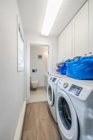 a utility room with dryer and washer