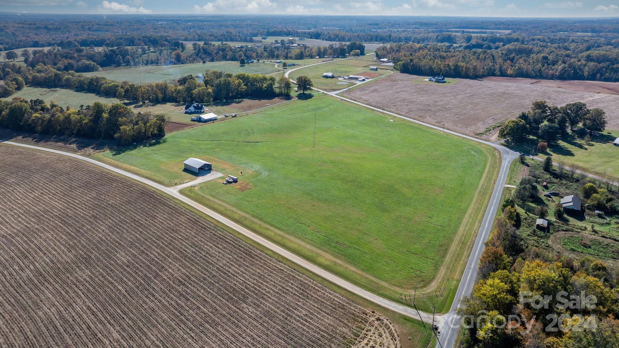 Lot 3 Foster Road Cleveland, NC 27013 - Photo 14 of 20 an aerial view of a golf course with parking space