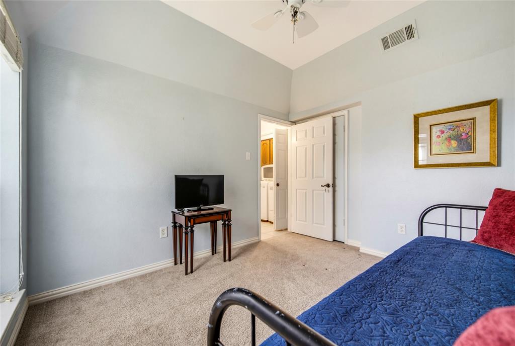 2835 Keller Springs Road, Unit 101 Carrollton, TX 75006 - Photo 19 of 22 2nd bedroom is off the kitchen area, split from the primary so great for privacy....