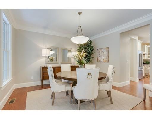 28 Hickory Hill Road Wayland, MA 01778 - Photo 14 of 30 a dining room with furniture a chandelier and wooden floor