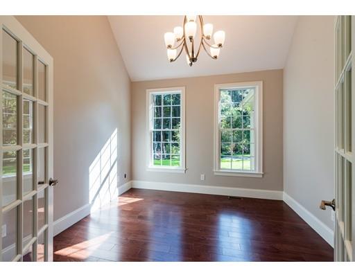 28 Hickory Hill Road Wayland, MA 01778 - Photo 16 of 30 a view of an empty room with wooden floor and a window