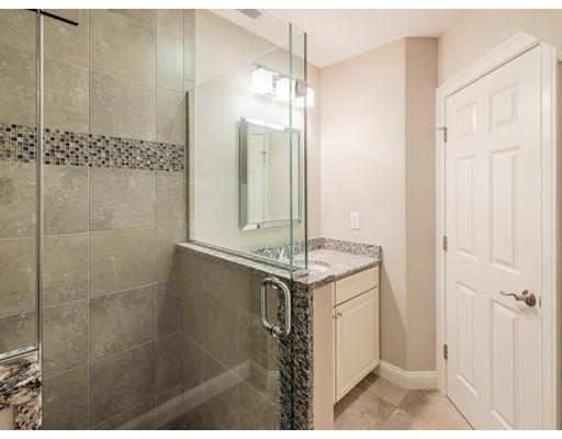28 Hickory Hill Road Wayland, MA 01778 - Photo 21 of 30 a bathroom with a granite countertop shower a mirror and a sink