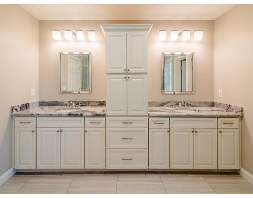 28 Hickory Hill Road Wayland, MA 01778 - Photo 22 of 30 a bathroom with a sink and a mirror