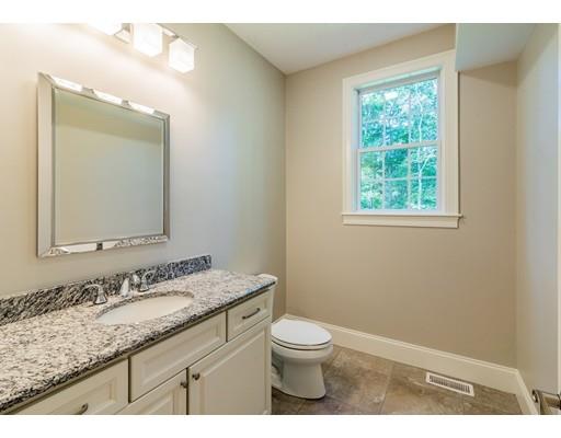 28 Hickory Hill Road Wayland, MA 01778 - Photo 23 of 30 a bathroom with a granite countertop sink toilet and mirror
