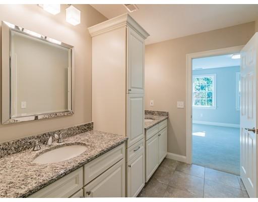28 Hickory Hill Road Wayland, MA 01778 - Photo 24 of 30 a bathroom with a granite countertop sink and a mirror