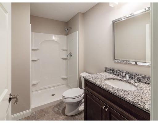 28 Hickory Hill Road Wayland, MA 01778 - Photo 25 of 30 a bathroom with a granite countertop sink a toilet and shower