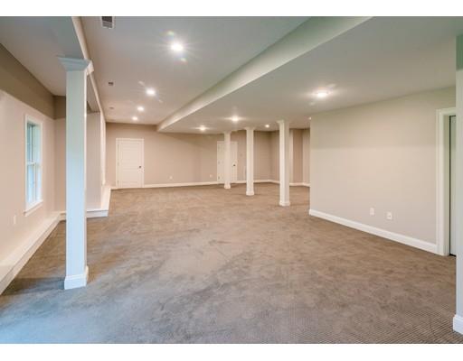 28 Hickory Hill Road Wayland, MA 01778 - Photo 27 of 30 a view of an empty room with wooden floor