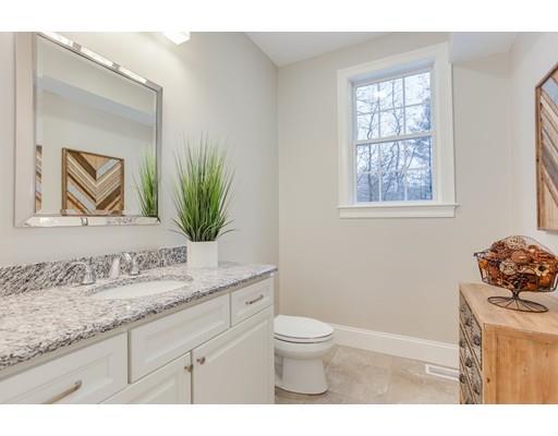 28 Hickory Hill Road Wayland, MA 01778 - Photo 28 of 30 a bathroom with a granite countertop sink mirror vanity and toilet
