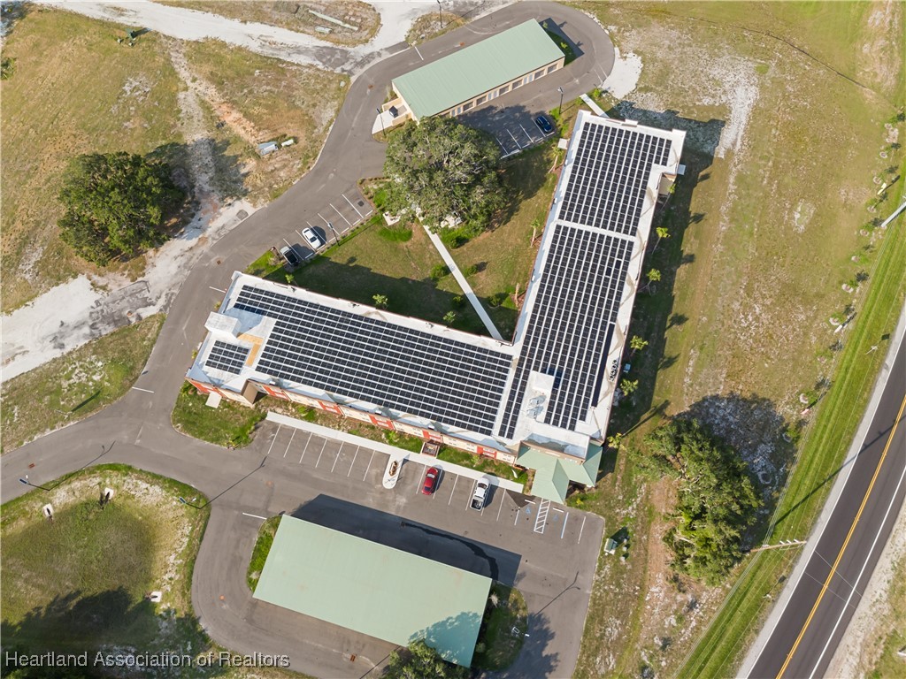 260 Spanish Moss Circle, Unit 101 Sebring, FL 33876 - Photo 17 of 35 an aerial view of a house having outdoor space