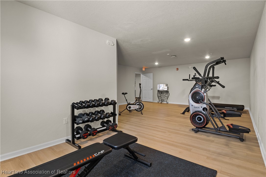 260 Spanish Moss Circle, Unit 101 Sebring, FL 33876 - Photo 27 of 35 a view of a room with gym equipment