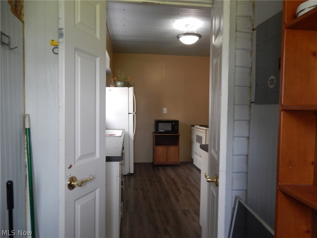 355 South 9th Street Coshocton, OH 43812 - Photo 21 of 35 mud room pantry looking into the kitchen