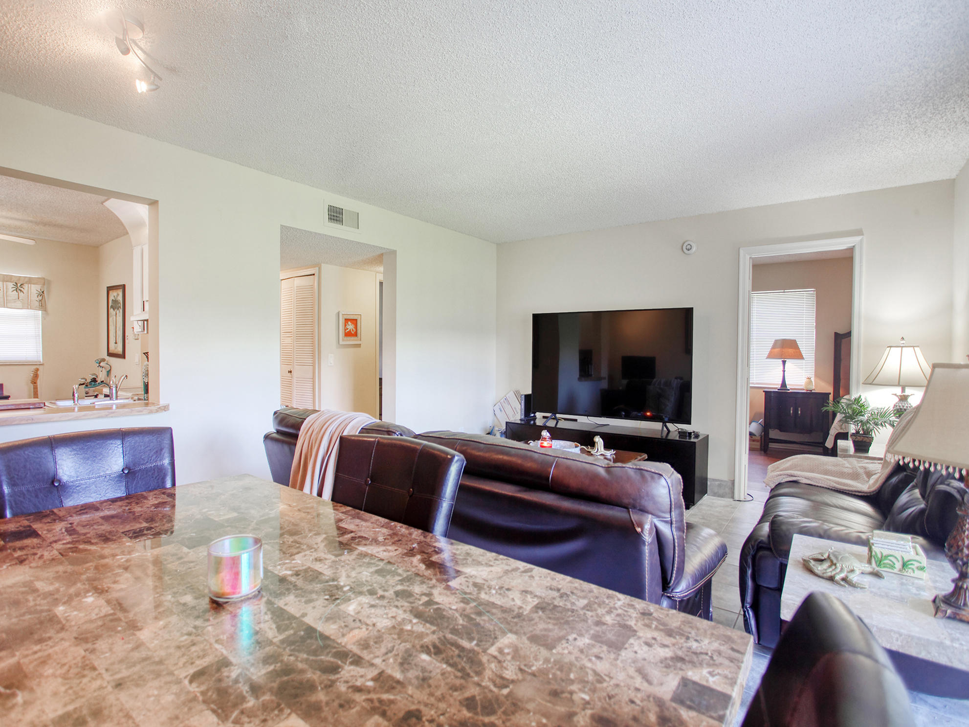 23398 Southwest 57th Avenue, Unit 301 Boca Raton, FL 33428 - Photo 4 of 21 DINING ROO
