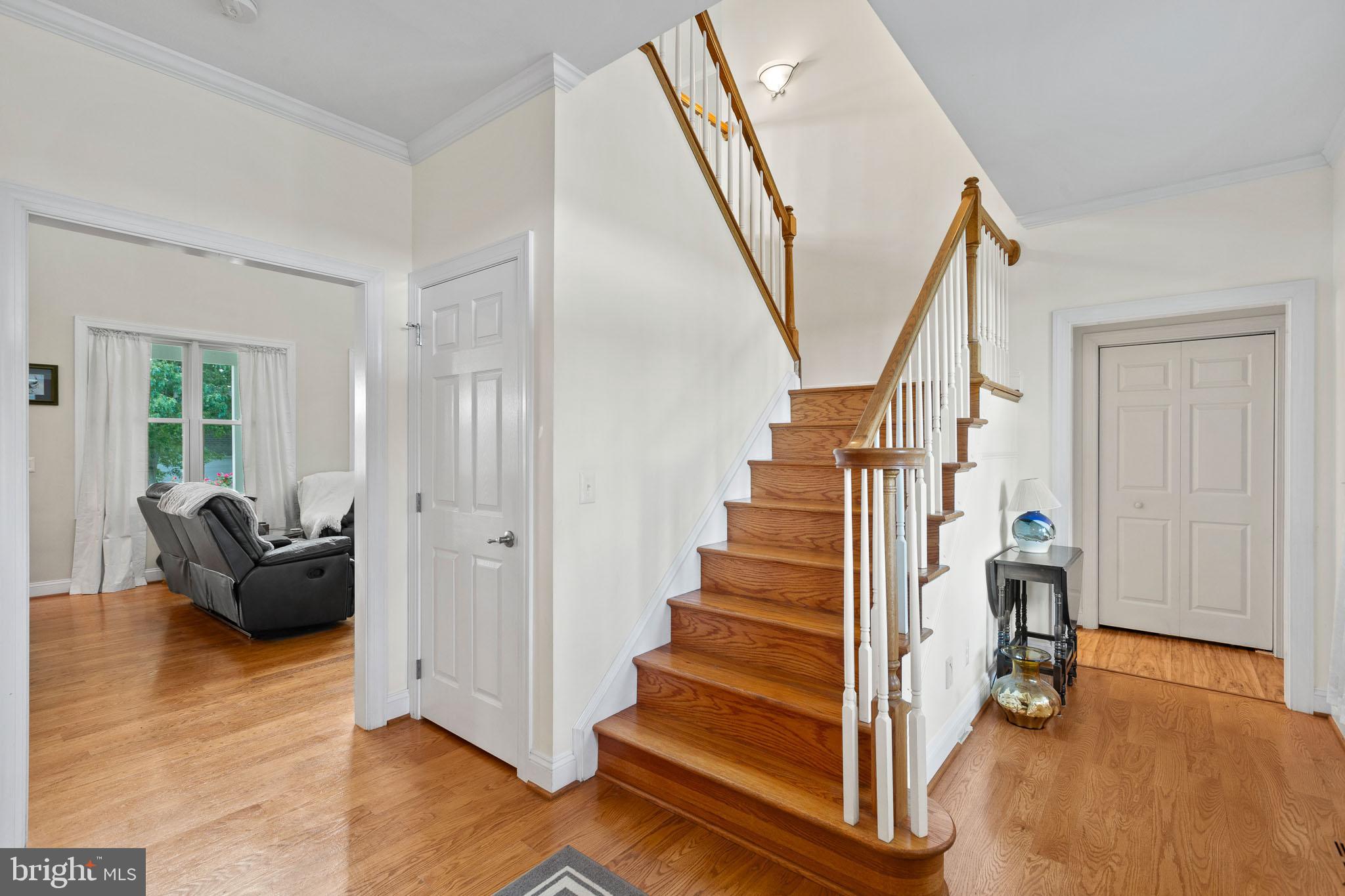 16405 Fishermen Way Ridge, MD 20680 - Photo 12 of 61 Staircase to side of entry