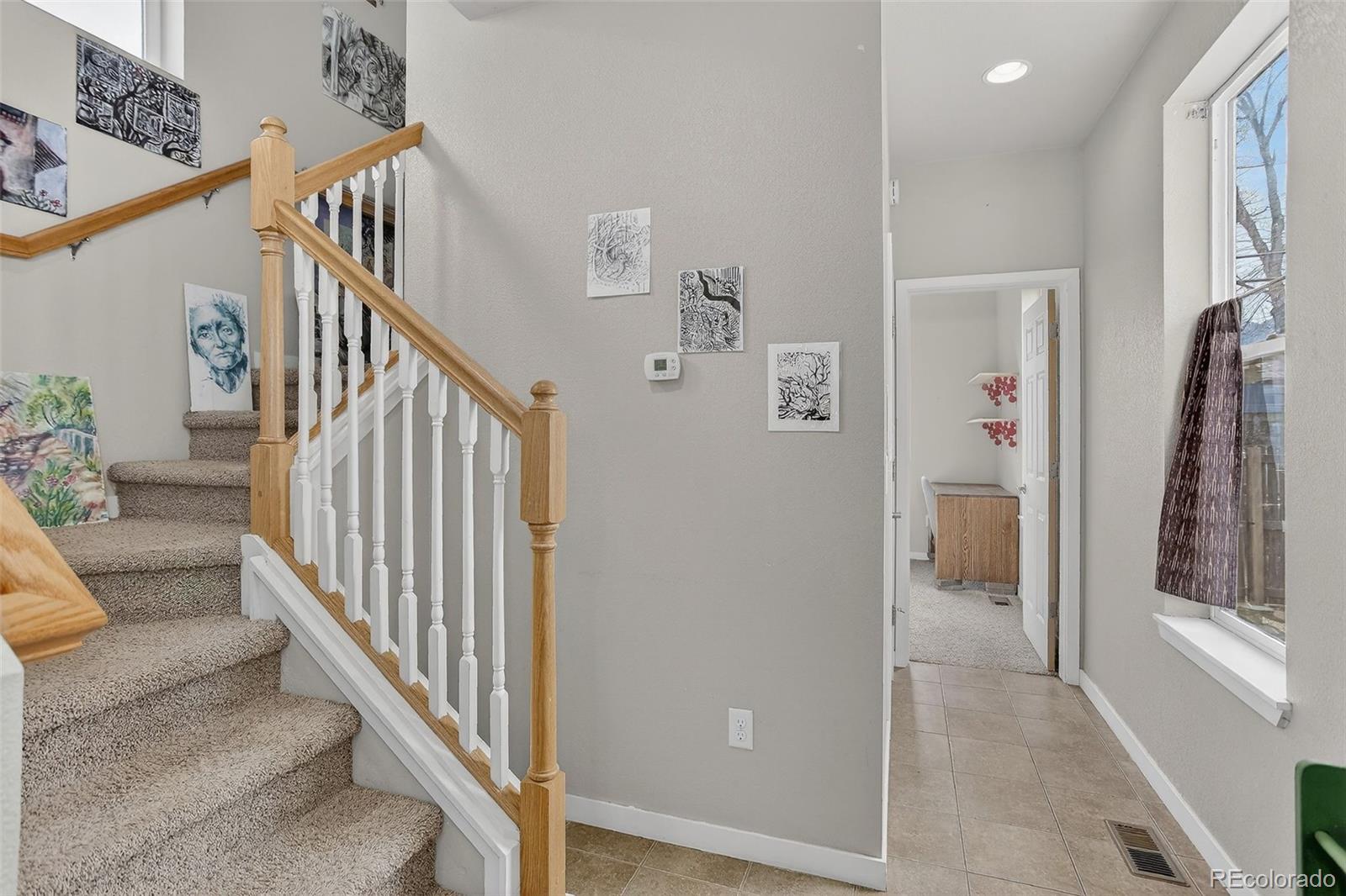 1902 Grove Street Boulder, CO 80302 - Photo 21 of 38 a view of entryway with stairs and furniture
