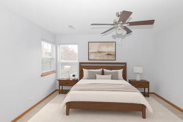 a bedroom with a bed and window