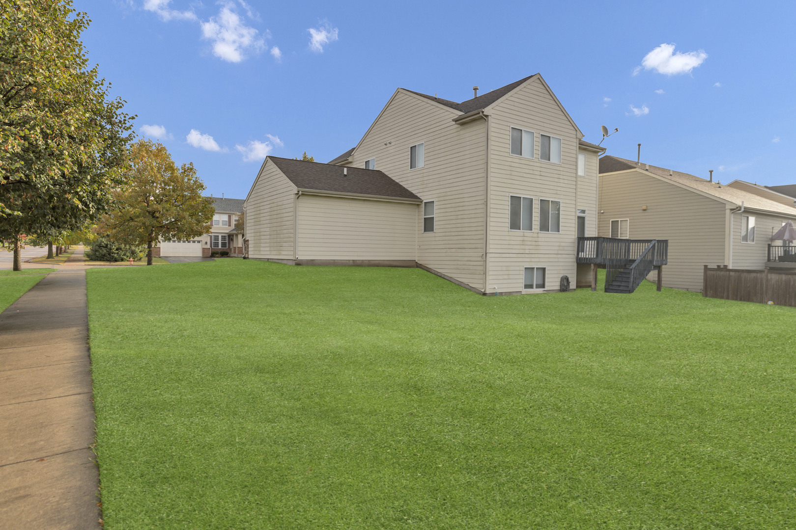3311 Lafayette Street Elgin, IL 60124 - Photo 48 of 50 a view of a house with a yard and garage