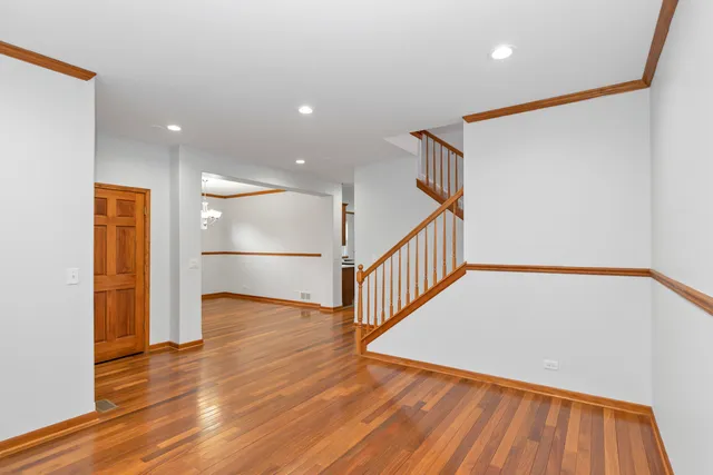 a view of entryway with wooden floor