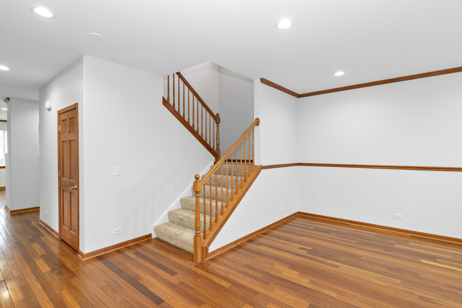 3311 Lafayette Street Elgin, IL 60124 - Photo 7 of 50 a view of entryway and hall with wooden floor
