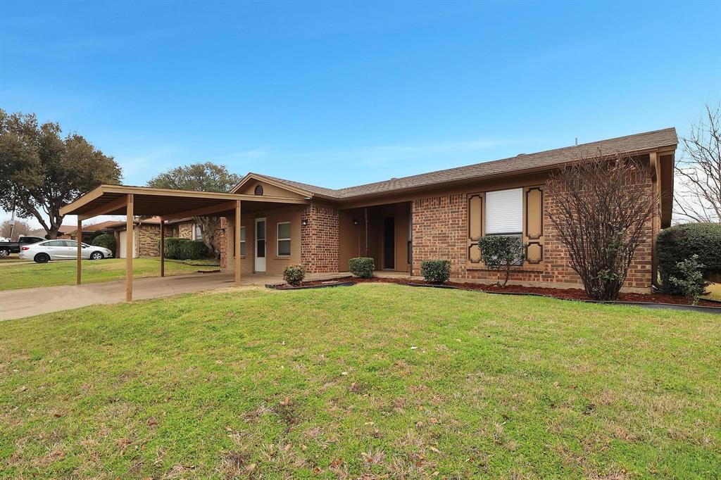 6632 Valley View Drive Watauga, TX 76148 - Photo 1 of 18 a front view of a house with a garden and porch