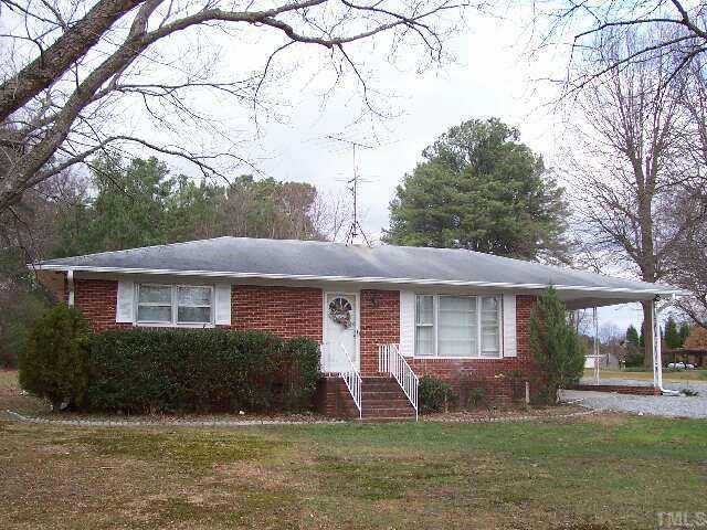 3539 Cheek Road Durham, NC 27704 - Photo 1 of 1 a front view of a house with garden