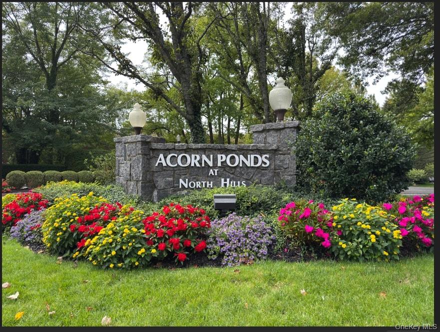 a view of front of flowers and trees