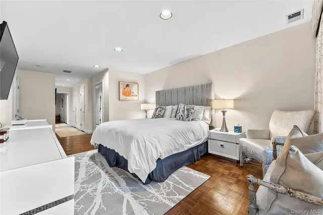 a bed room with a bed and a couch